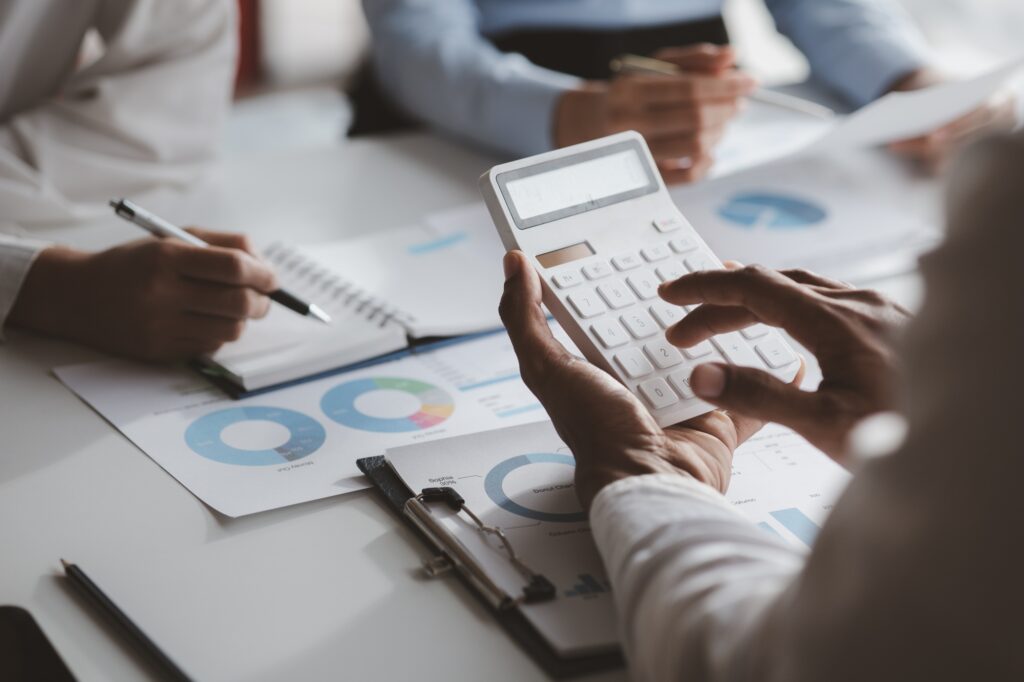 Company meeting room has businessmen and finance managers meeting together on finance topics, they a