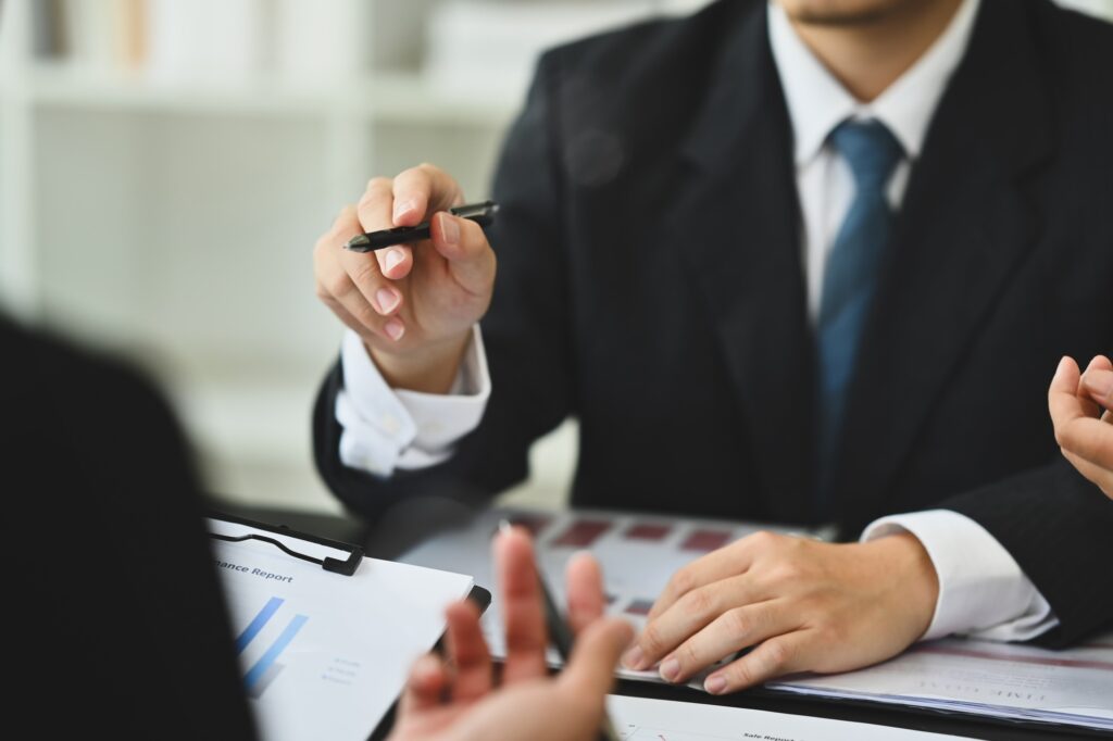 Cropped shot of bank manager or financial advisor meeting client at office